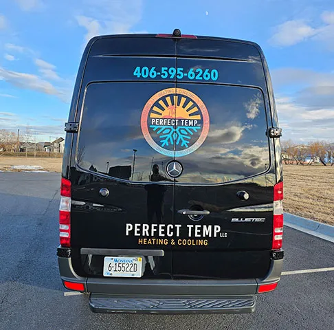 The back of the Perfect Temp van with the phone number across the top